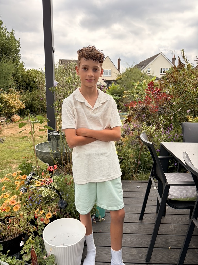 Dexter standing on the garden deck