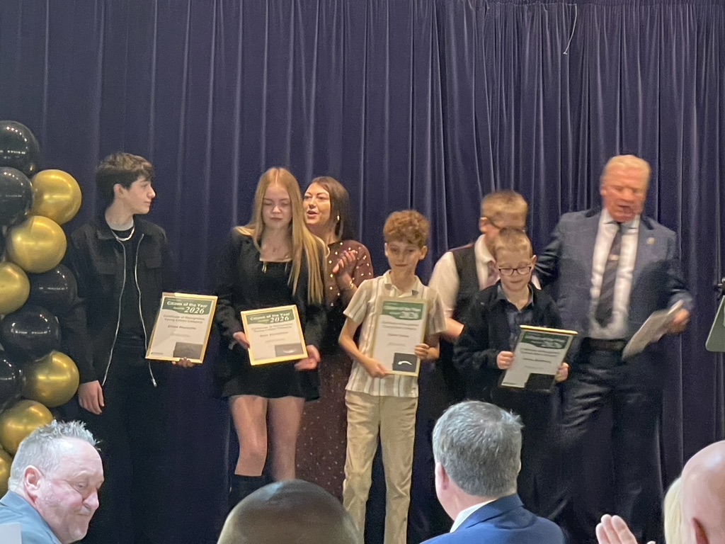 Dexter on stage at the Rayleigh Citizen of the Year awards receiving his Certificate of Recognition