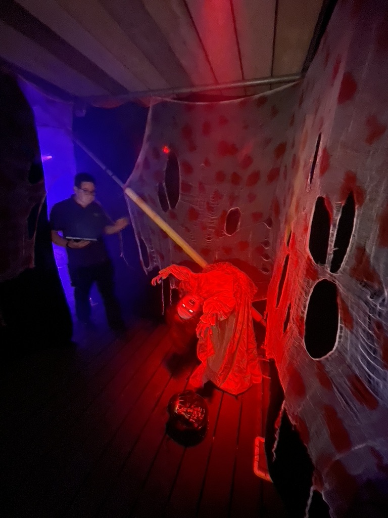 A crawling figure in the red room