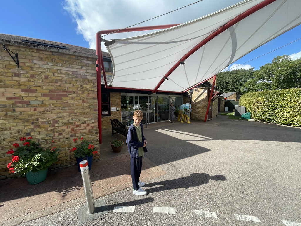 Dexter outside the entrance to Little Havens Children's Hospice